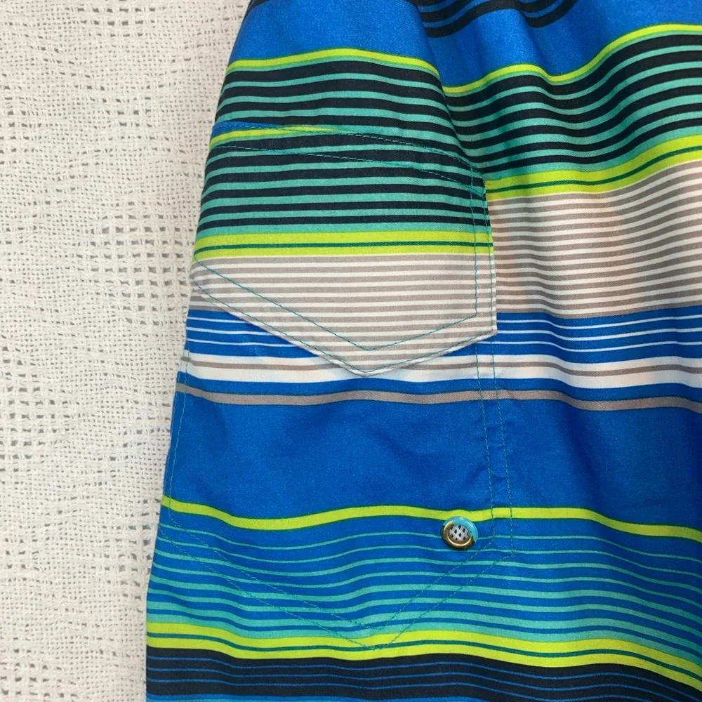 OT Revolution Boys M 8/10 Blue Striped Swim Trunks Mesh Lined Pockets Elastic